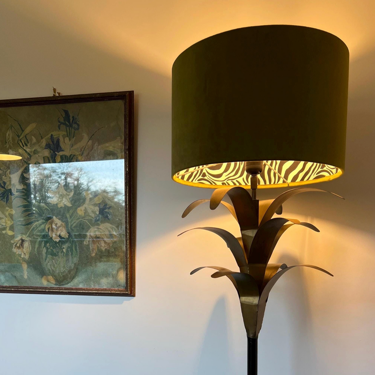 Olive green velvet drum lampshade with zebra cotton interior and leaf-shaped brass base for ceiling light use
