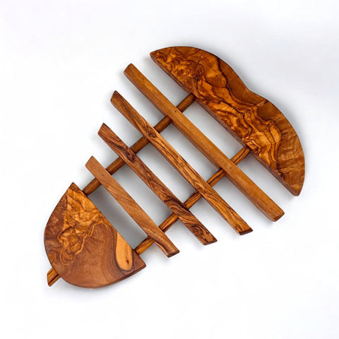 Handcrafted olive wood pear pan coaster 21 cm with natural grain and distinctive leaf-shaped cutting board design