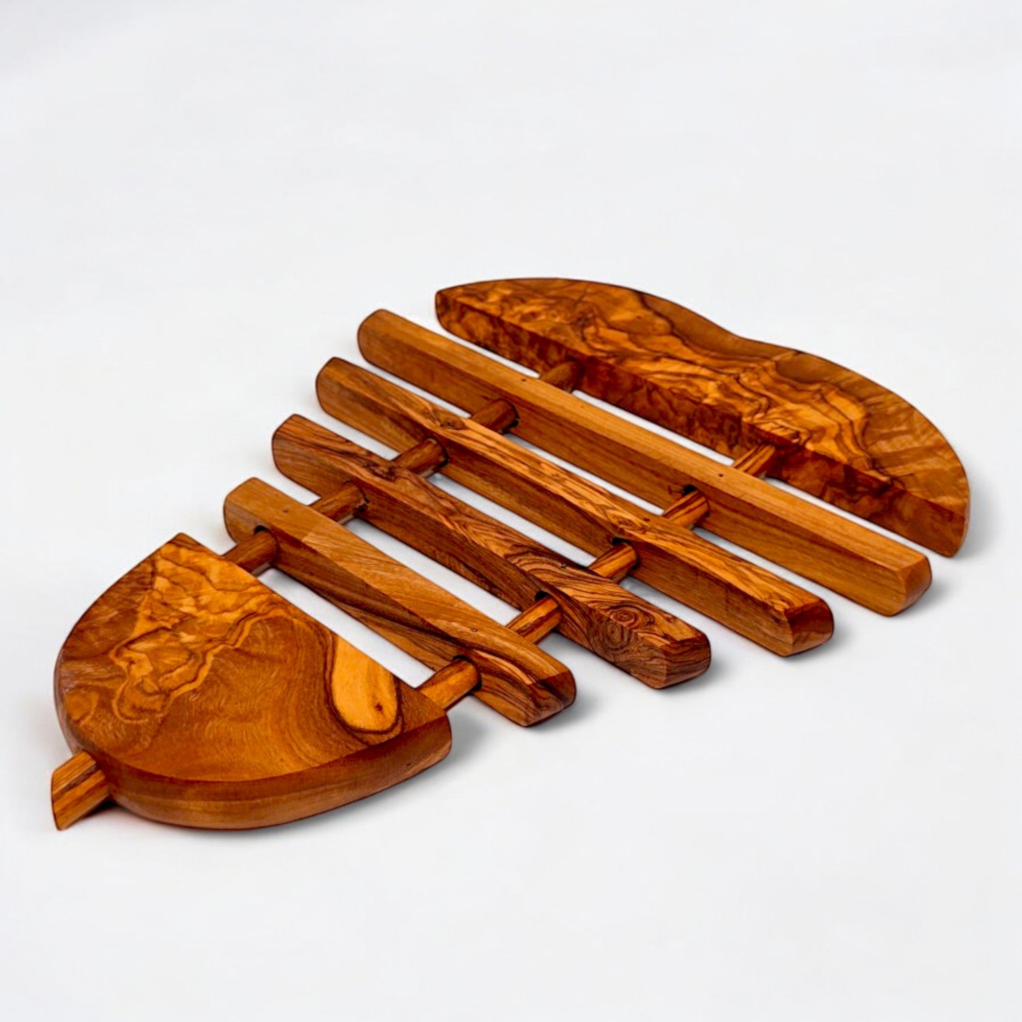 Handcrafted olive wood pear pan coaster 21 cm with warm brown finish and distinctive swirling grain patterns