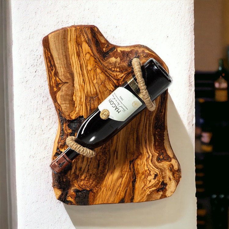Rustic olive wood bottle holder with natural shape and golden brown grain patterns for two wine bottles