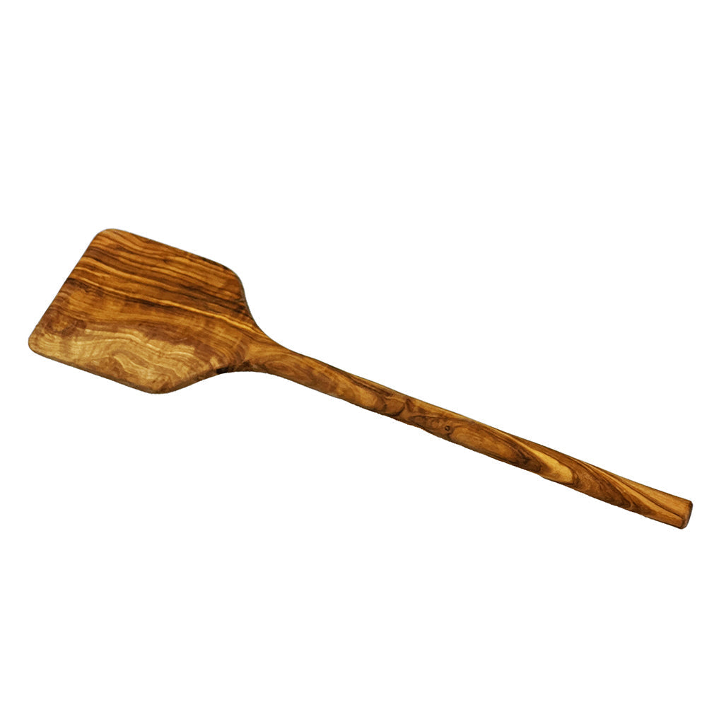 A rustic olive wood short spatula with warm brown finish and swirling grain patterns for cooking and serving