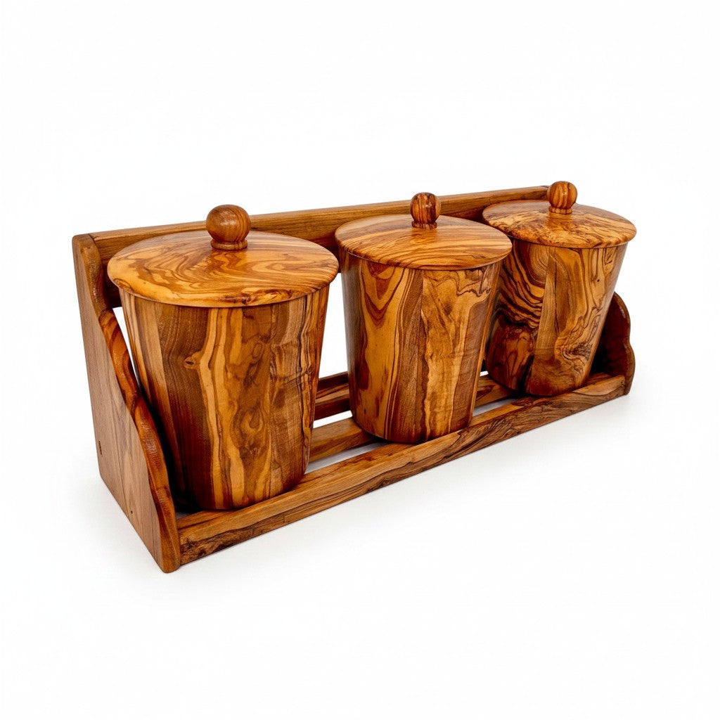 Set of three olive wood storage canisters with lids and knobs perfect for storing dry ingredients in the kitchen