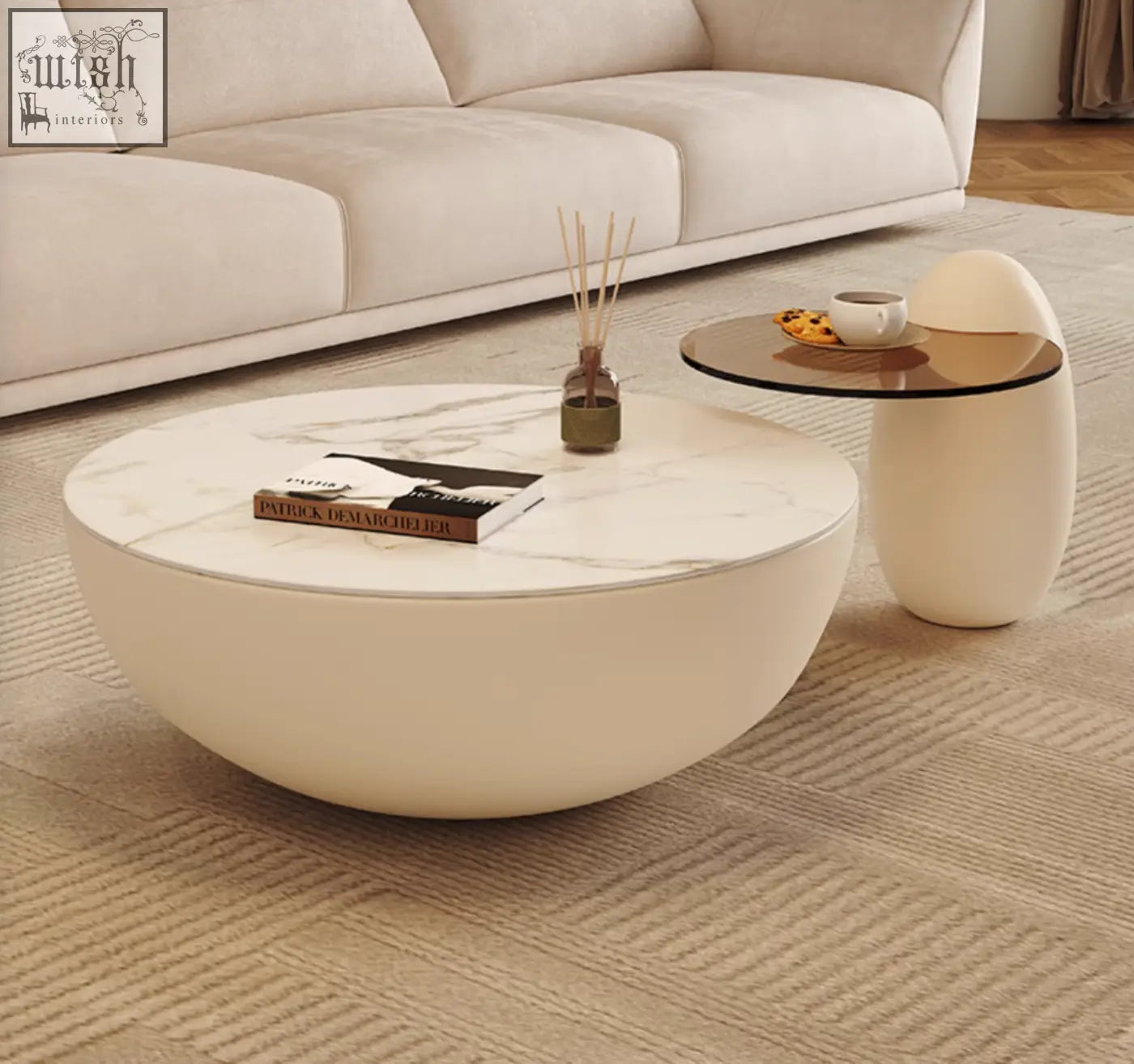 Cream-colored nesting coffee table with white marble top and smooth rounded edges perfect for stylish living spaces