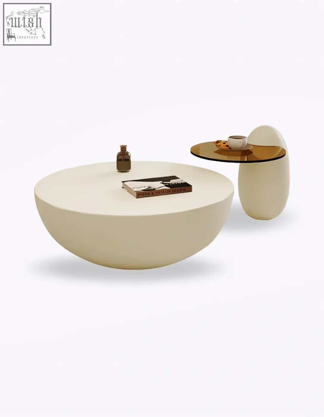Cream-colored egg-shaped nesting coffee table with smooth matte finish and minimalist design for modern spaces