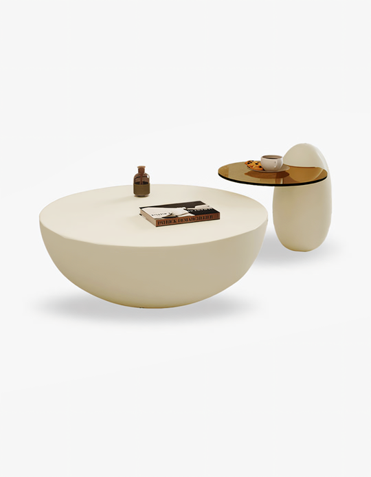 Cream-colored egg-shaped white nesting coffee table with smooth matte finish and minimalist design by oliver