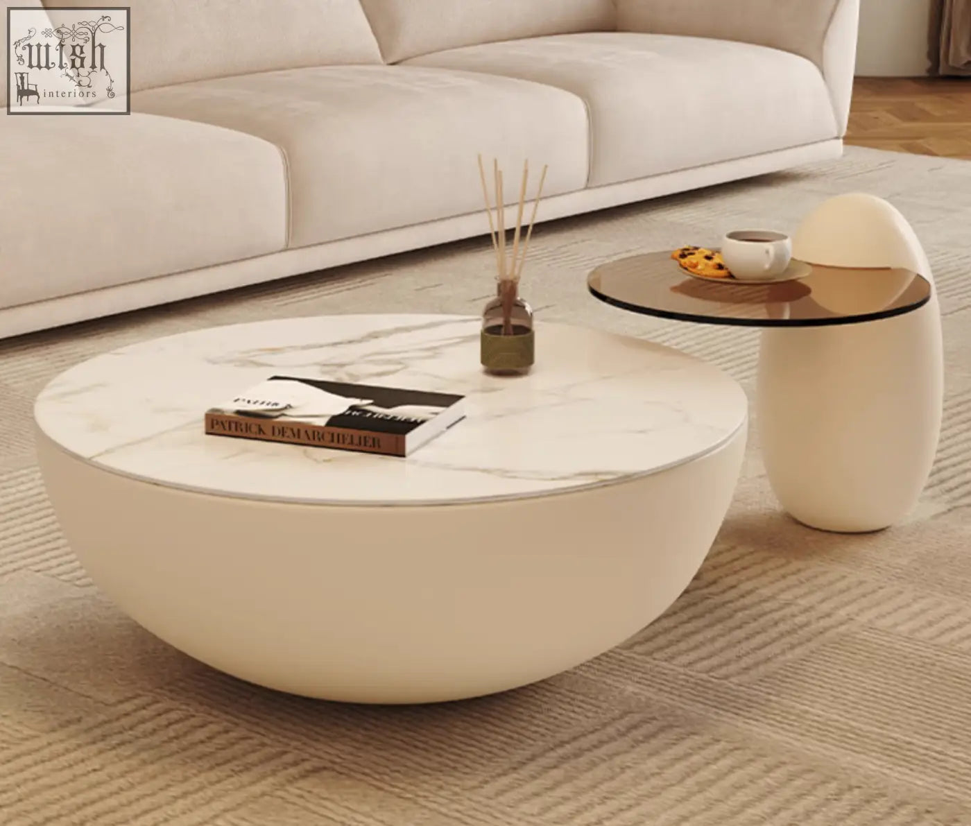 Cream-colored nesting coffee table with marble-patterned top and smooth curved sides from oliver nesting coffee table white