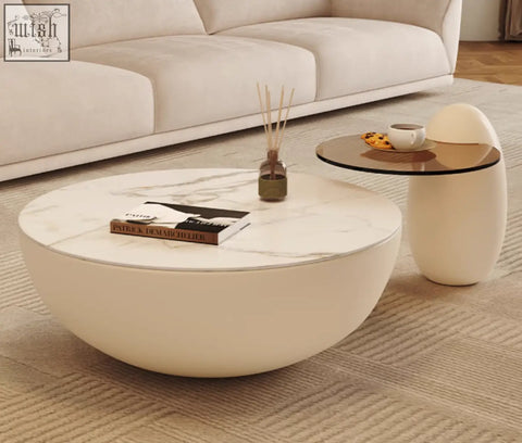 Cream-colored nesting coffee table with marble-patterned top and smooth curved sides from oliver nesting coffee table white