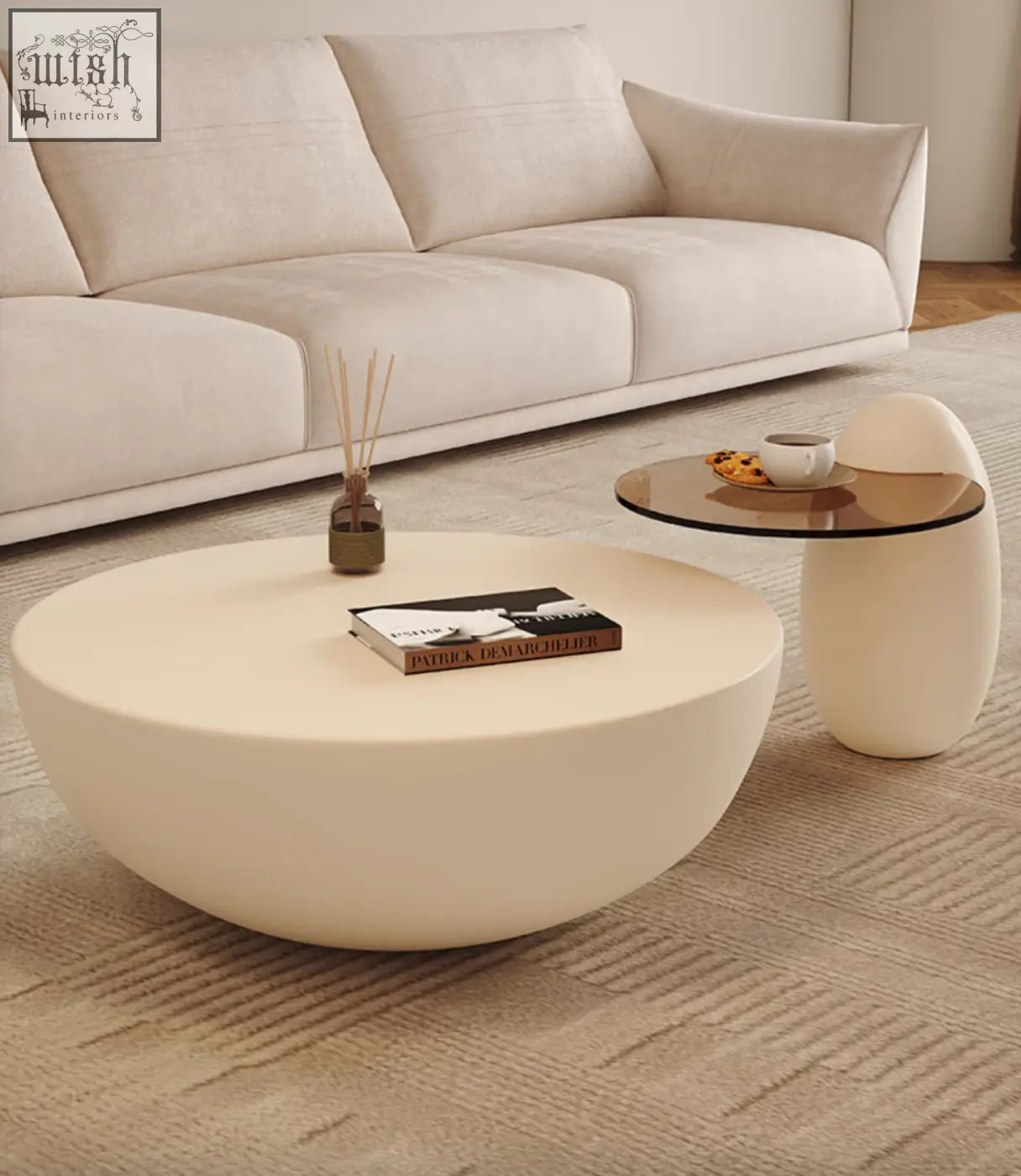 Cream-colored smooth oval nesting coffee table with minimalist design perfect for modern living spaces