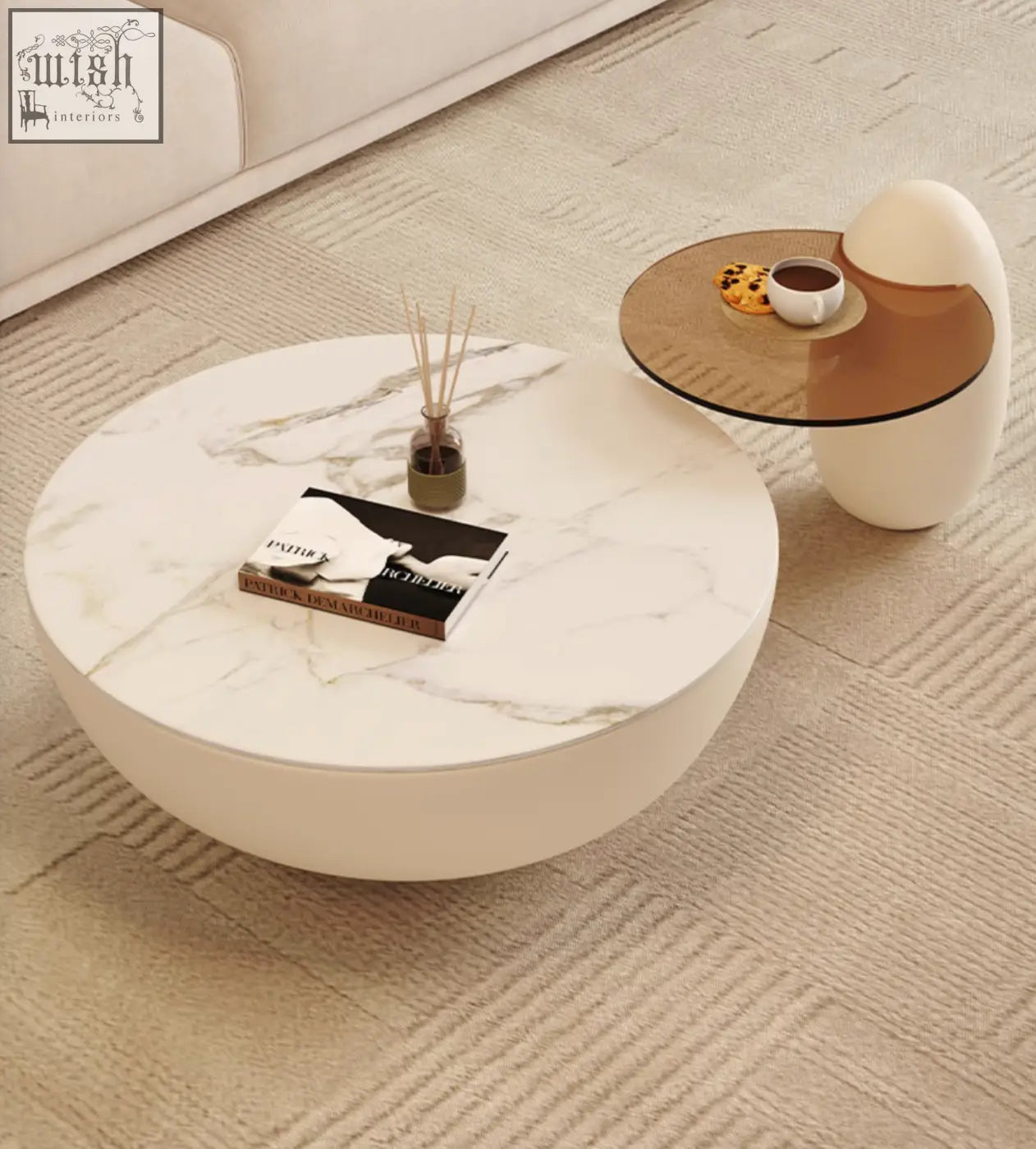 White marble-top coffee table with sleek rounded base perfect as a modern nesting coffee table design