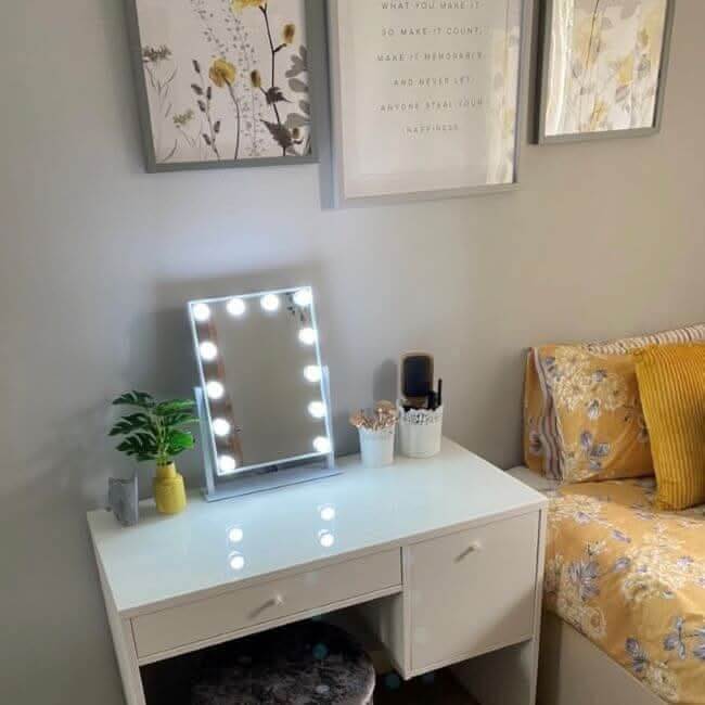 A rectangular olsen hollywood mirror white 47x37cm with silver frame and 12 bright led lights around it