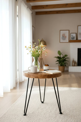 Round wooden coffee table with black metal hairpin legs pictured table from olva chunky collection