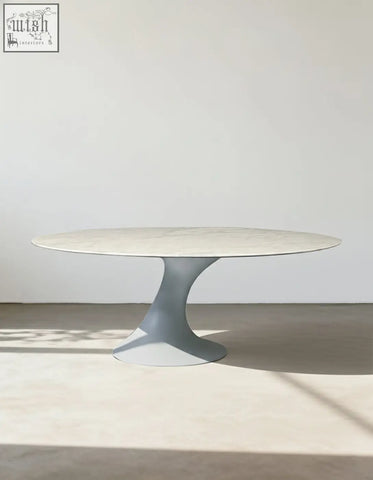 Omer oval dining table with smooth light marble top and sleek gray pedestal base perfect for dining room oval dining