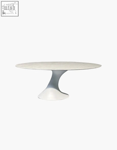 White marble top omer oval dining table with a sleek sculpted base perfect for any stylish dining room