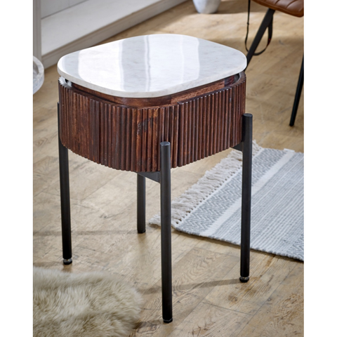 Opal mango wood bedside table with white marble top and black metal legs featuring rich brown mango wood bedside body