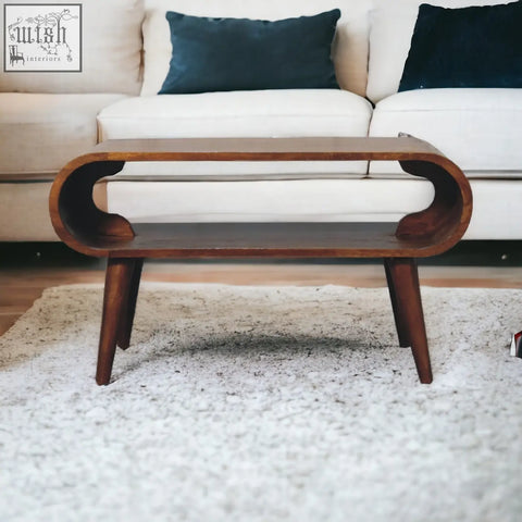 Open chestnut coffee table with sleek curved design and rich chestnut finish in mango wood for stylish living rooms
