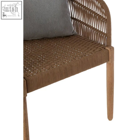 Brown woven wicker opus armchair with a light grey cushion perfect for indoor or outdoor seating