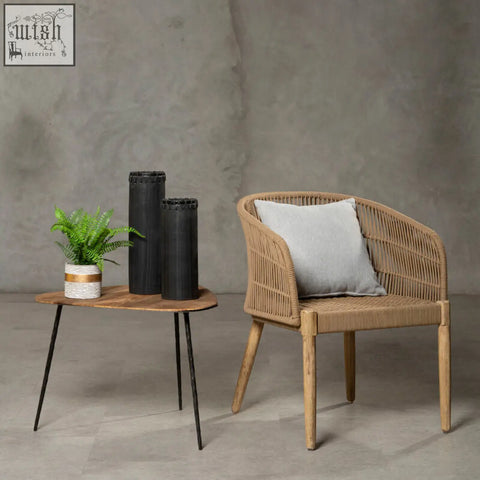 Opus armchair woven rattan with light wood legs and comfy light grey cushion for stylish seating