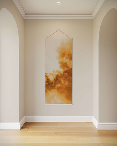 A vertical orange smoke tapestry with abstract orange and beige cloud patterns framed by a simple white border