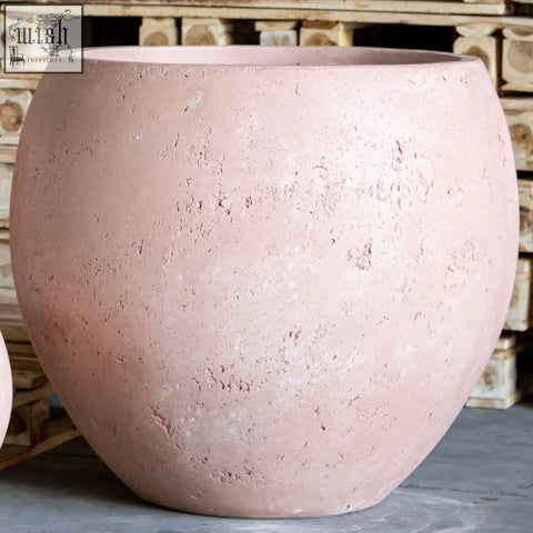 Rustic pink terracotta orbello 35cm planter with textured weathered surface and rounded wide mouth design