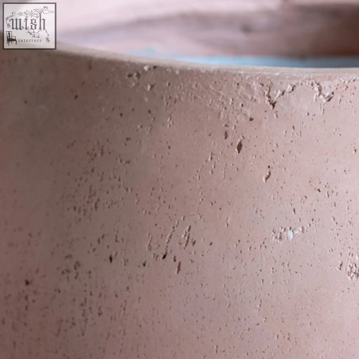 Textured matte pink orbello 35cm planter made of concrete with subtle speckles perfect for medium plants