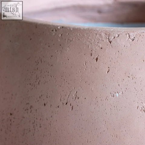 Textured matte pink orbello 35cm planter made of concrete with subtle speckles perfect for medium plants