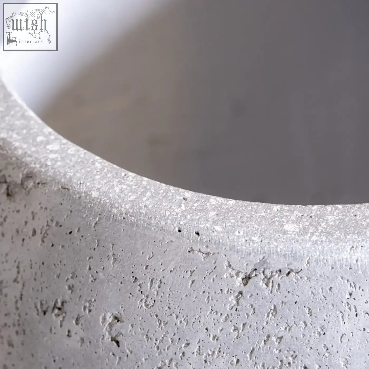Orbello onyx dusk 70cm extra large round planter in pigmented cement stone with a textured light gray finish for small trees