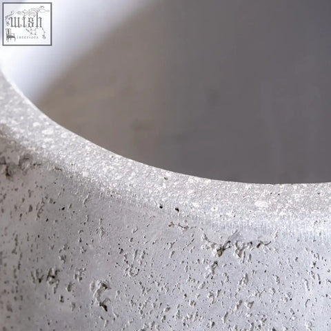 Orbello onyx dusk 70cm extra large round planter in pigmented cement stone with a textured light gray finish for small trees
