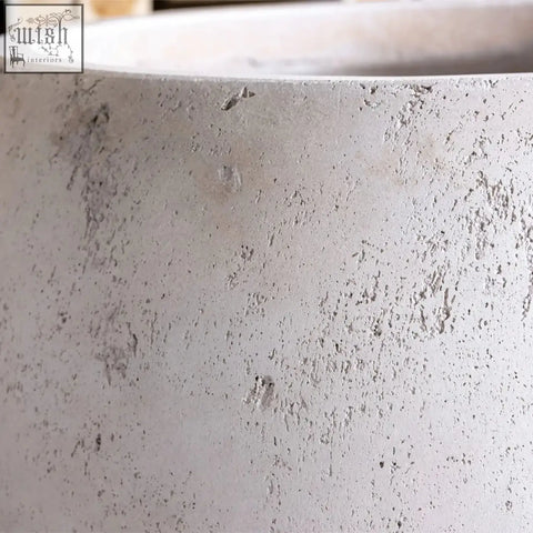 Textured light gray orbello 55cm planter made of concrete with smooth inner rim and subtle surface imperfections