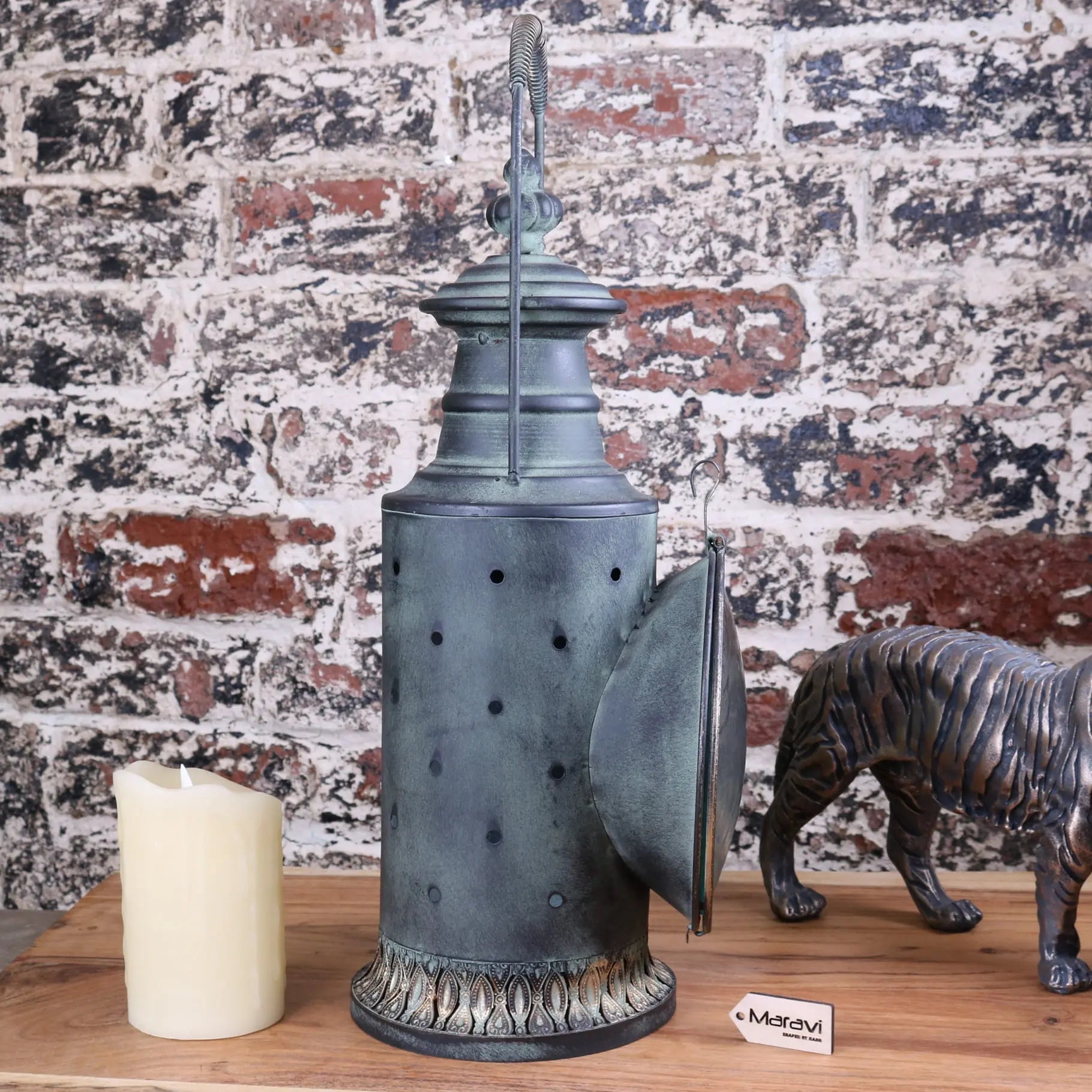 Antique-style orchha vintage style railway lantern with dark green patina metal and perforated sides on ornate base