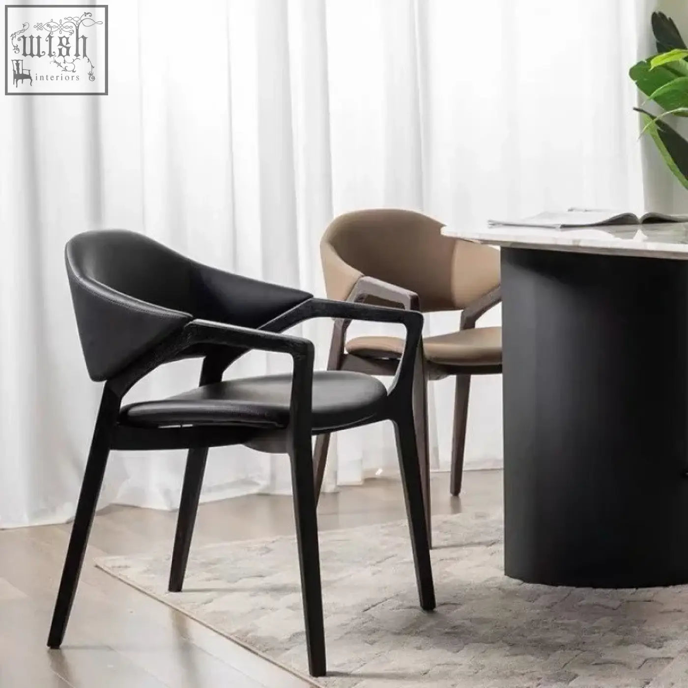 Black leather orego chair with sleek modern design wooden frame and leather upholstery from nīsu home