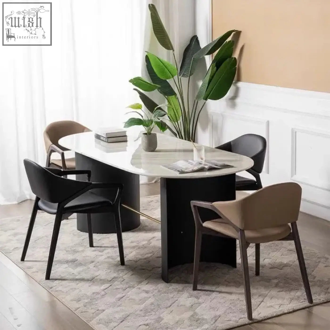 Modern oval dining table with polished white marble top and sleek black legs by nīsu home with wooden frame