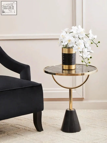 Oria black glass side table with gold and black marble base and sleek modern design for stylish living spaces