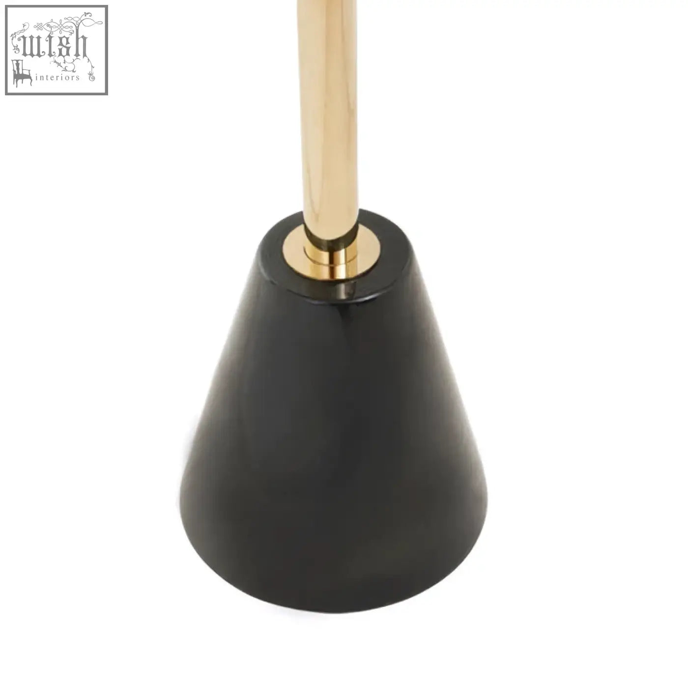 Black matte ceramic plunger with polished gold-tone handle beside oria black glass and marble base side table