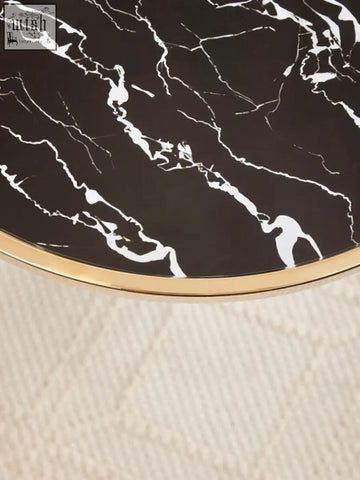 Black and white marble-top coffee table with gold edge featuring oria black glass and marble base side table design