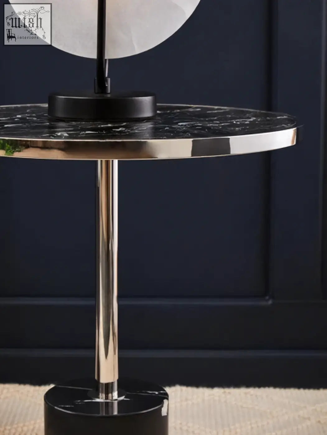 Oria black marble end table with polished gold toned stainless steel pedestal and base for stylish living spaces
