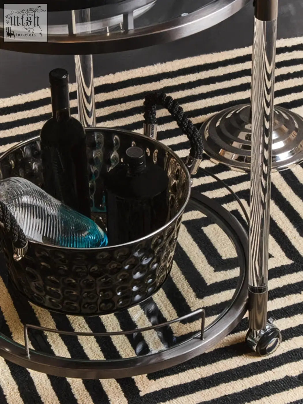 Black textured metal tier drinks trolley with glass top and chrome legs perfect for serving drinks
