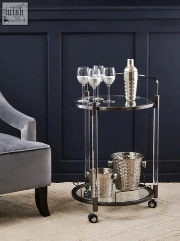 Silver-toned oria round 2 tier drinks trolley with glass shelves and hammered metal finish for stylish tier drinks storage