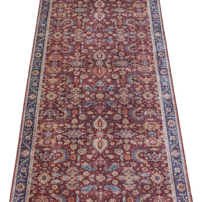 A vintage oriental vivana rug runner with a burgundy field and faded floral and geometric vintage medallion patterns