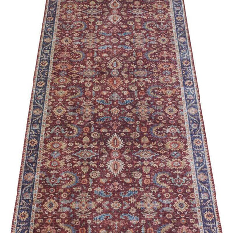 A vintage oriental vivana rug runner with a burgundy field and faded floral and geometric vintage medallion patterns
