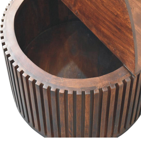 Dark brown wooden orion slatted coffee table with a gear-like segmented exterior and a hinged lid for storage