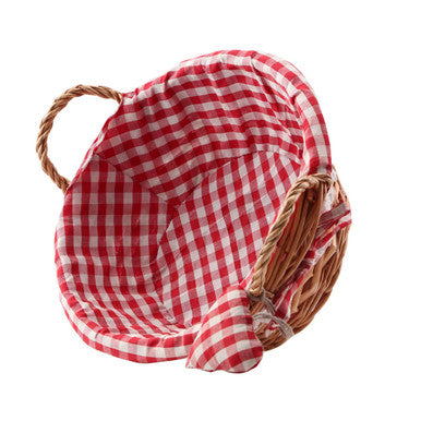Red and white checkered red gingham lining woven willow bread basket with a natural fiber handle