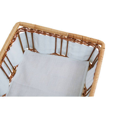 Woven wicker fern basket with light beige frame and white lining perfect for natural storage solutions