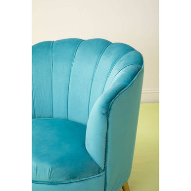 Plush turquoise blue velvet scalloped curved armchair with gold wood legs for stylish living spaces