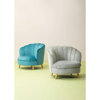 Two upholstered armchairs with velvet scalloped curved backs in blue and gray fabric with wood legs