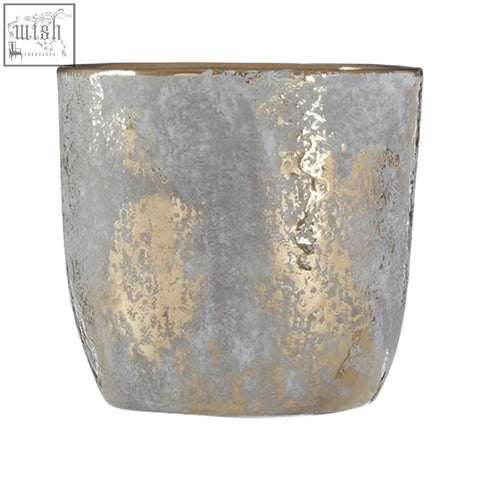 A small grey and gold ceramic planter with a textured metallic finish perfect as a gold ceramic planter option