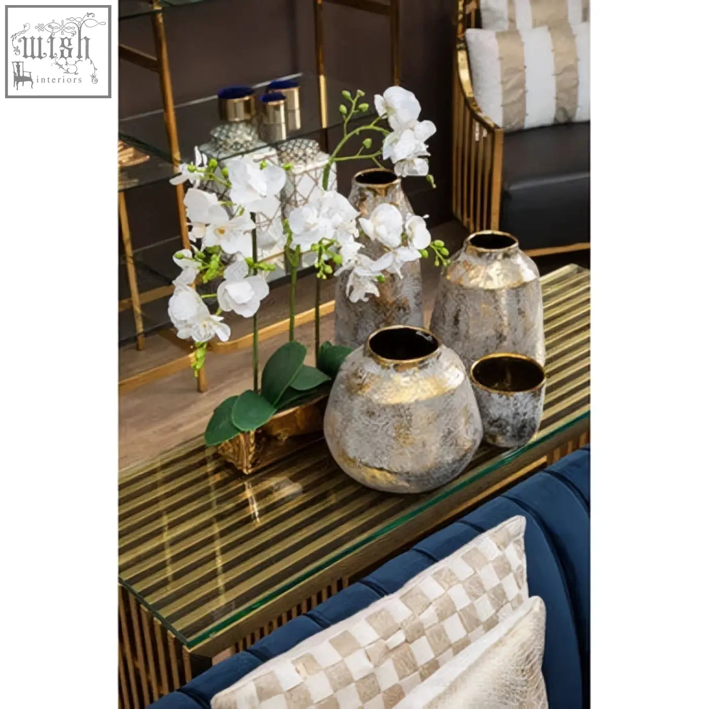 Silver-toned distressed ceramic vases with a rustic finish in the orvena small grey and gold ceramic planter style