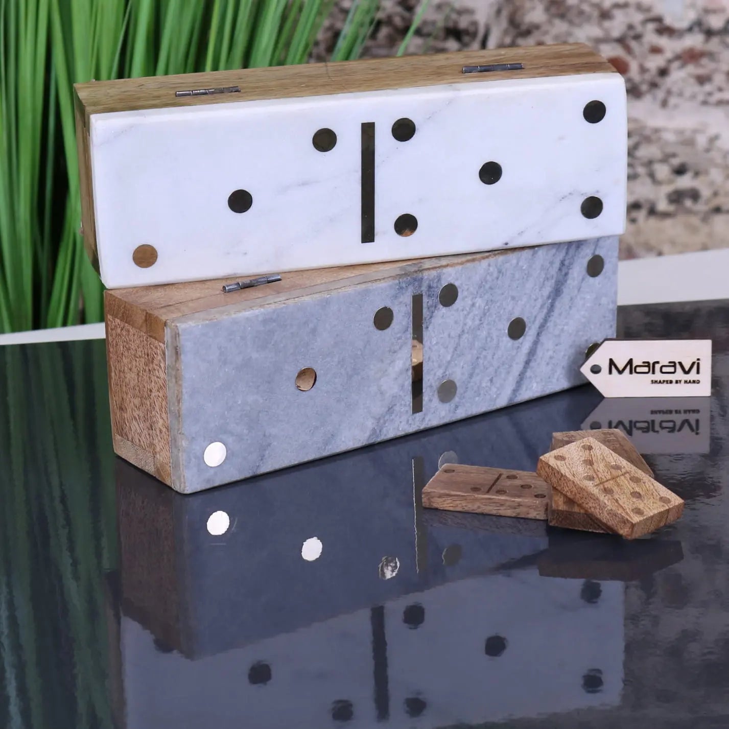 Osian marble lid luxury dominoes set with maravi dominoes featuring marble effect tiles and natural wood pieces is a luxury dominoes set