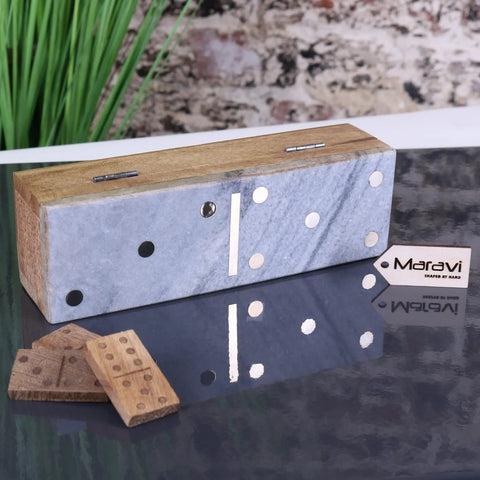 Handcrafted rectangular dominoes set with light gray marble lid, natural wood sides, and black white dot accents for luxury play
