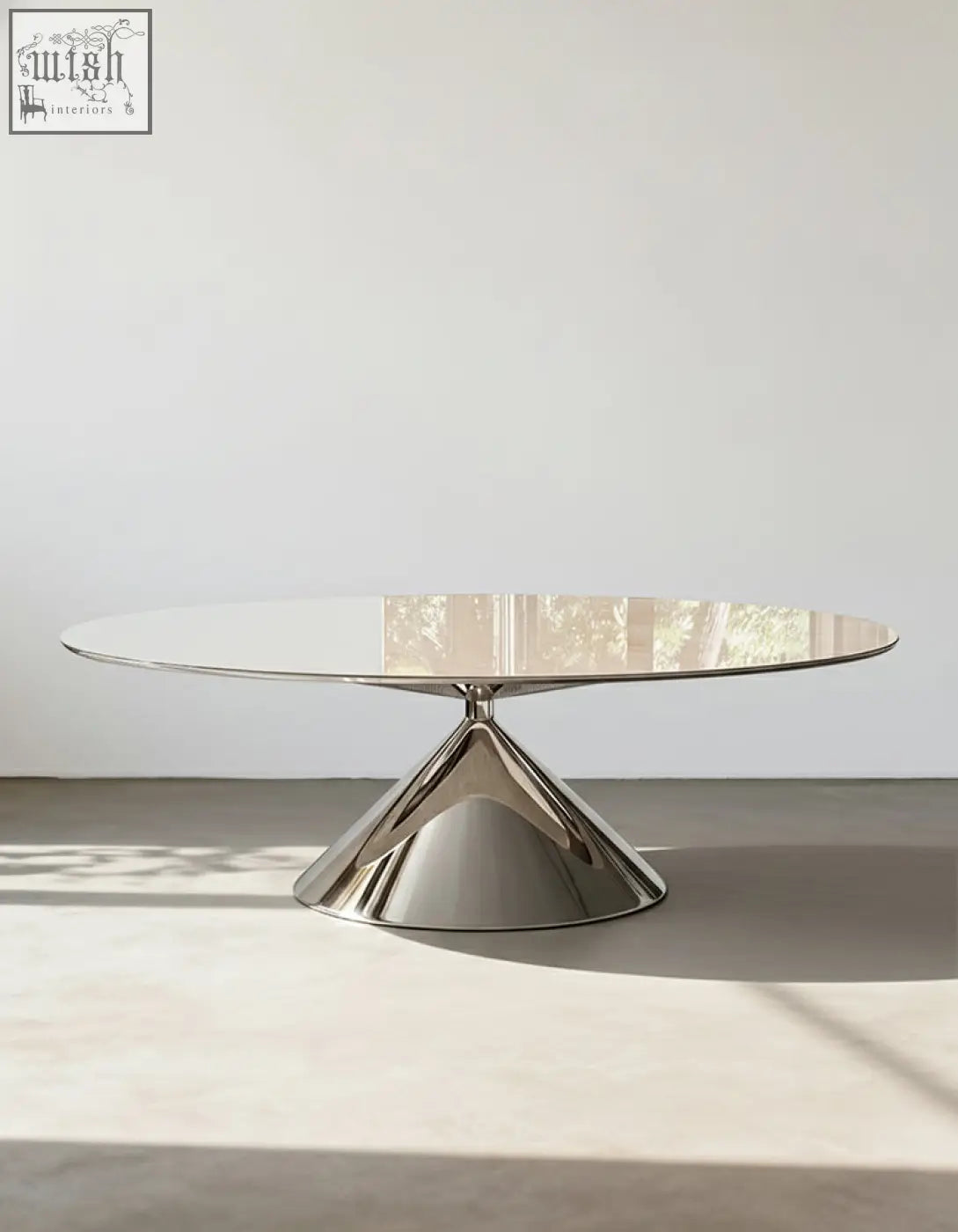 Modern oval dining table with reflective glass top and sleek chrome base perfect for stylish oval dining spaces