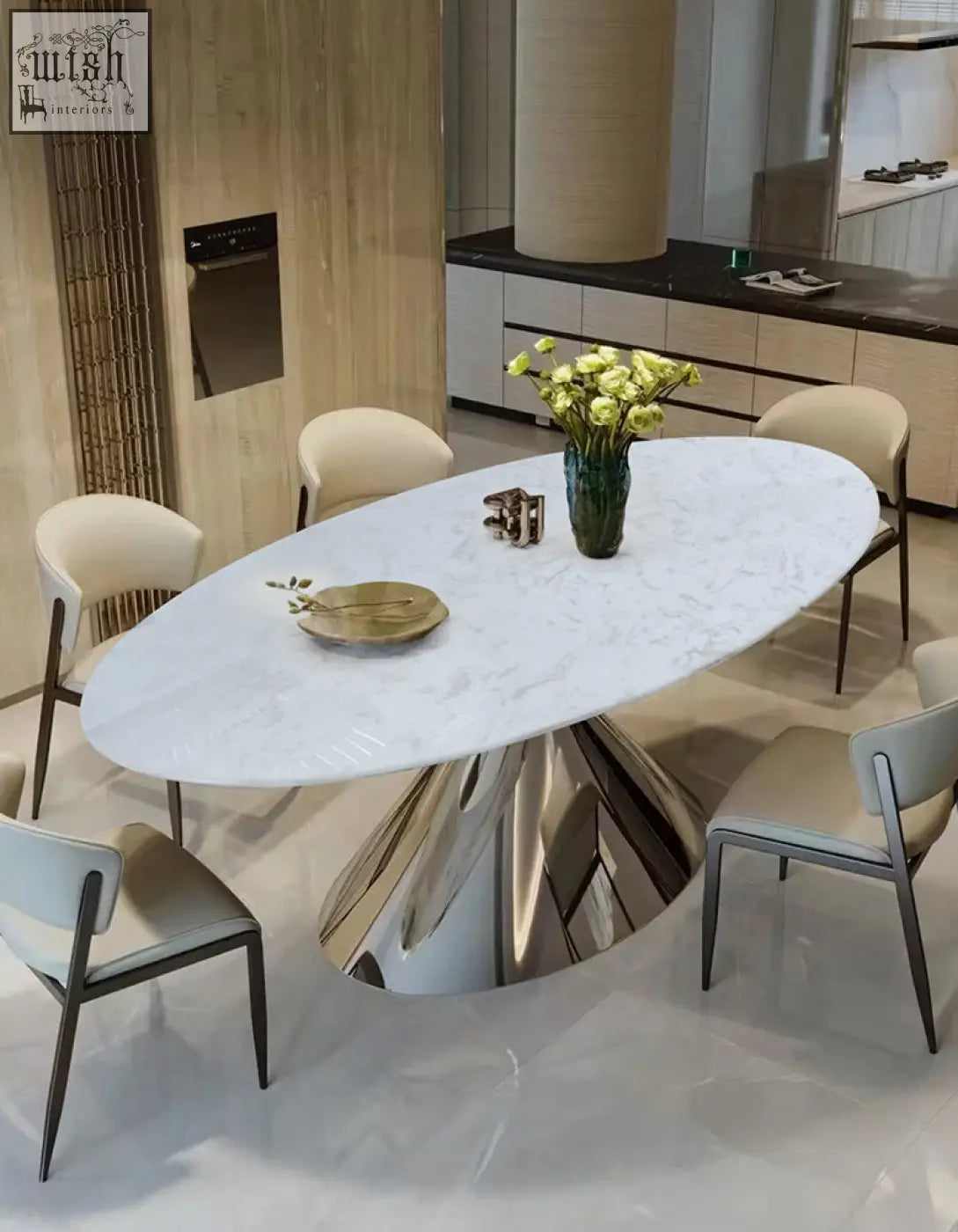 White marble oval dining table with sleek chrome pedestal base from osim oval dining collection